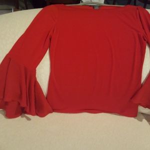 Red shirt with flowing sleeves